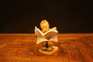porcelan/chlapec-noviny-1