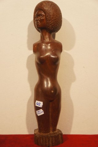 žena