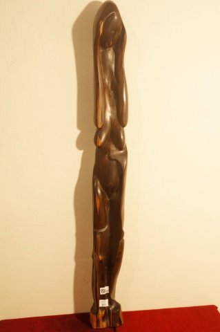 žena