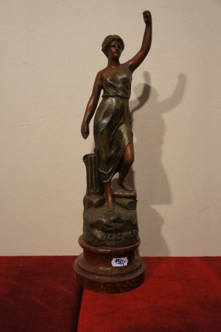 žena