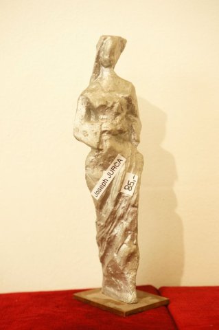 žena