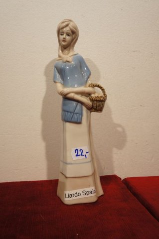 žena
