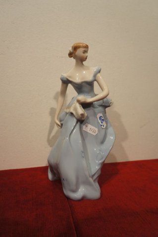 žena